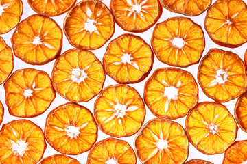 Dried tangerines on a white background. Dried oranges isolated, flat lay