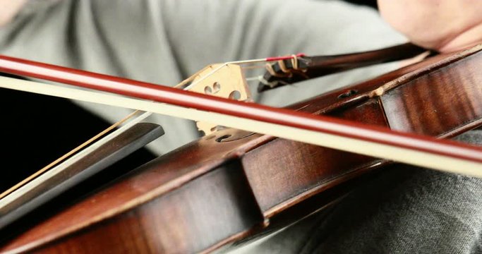violinist playing - closeup of her hands