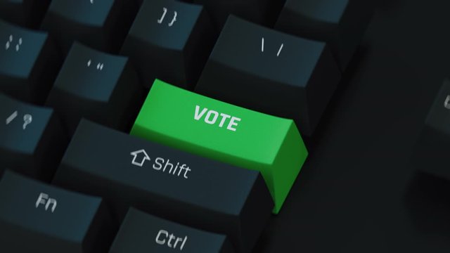 Vote computer key. Citizen responsibility, elections, democracy. Computer key concept