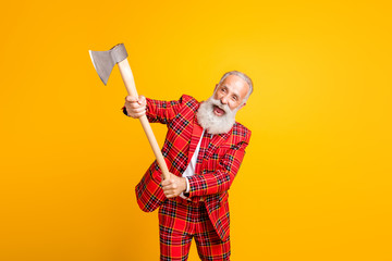 Portrait of his he nice handsome attractive crazy mad funky gray-haired man cutting invisible object with ax isolated over bright vivid shine vibrant yellow color background
