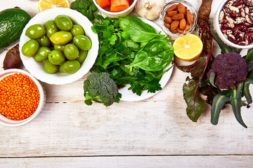 Foods for healthy liver on white wooden background. Liver detox diet food concept . Health foods high in antioxidants and fiber..