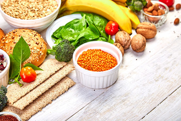 Selection food rich in fiber on white wooden background, Healthy diet food product. Top view, flat lay, copy space..