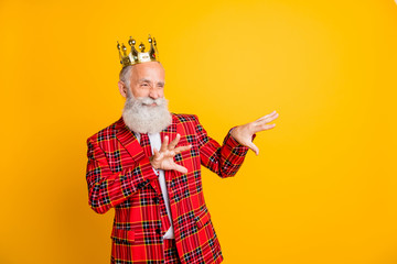 Portrait of his he nice handsome attractive arrogant mannered gray-haired man showing gesture choosing look isolated over bright vivid shine vibrant yellow color background © deagreez
