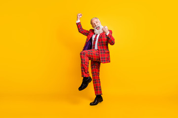 Fototapeta na wymiar Full length body size view of his he nice handsome attractive cheerful cool lucky gray-haired man winner celebrating luck win isolated over bright vivid shine vibrant yellow color background