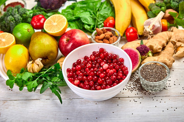 Assortment product of rich in antioxidants and vitamins sources on white wooden background, Healthy food nutrition dieting concept. Top view, flat lay, copy space..
