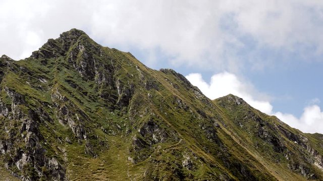Clouds passing over fagaras mountain peak 4K video
