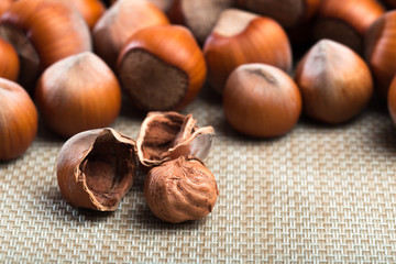 close up of hazelnuts on table .