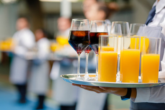 Waiters Serving Drinks In Cocktail