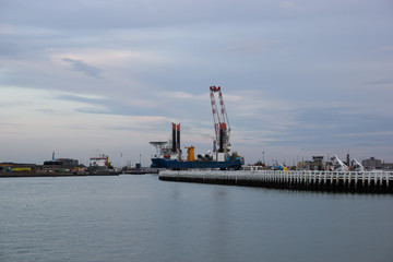 Obraz premium Lighthouse in Ostende port at North sea