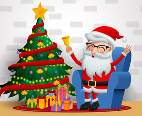 Santa claus sitting vector background design. Christmas santa claus character happy sitting in chair and holding bell with christmas tree in colorful lights, balls and gift elements in white wall back