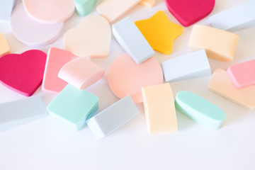 Assorted cosmetic sponges.