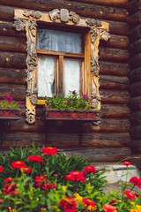 Fototapeta na wymiar old style house made of logs