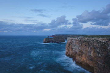 Fototapeta na wymiar Cliffs at Cabo de São Vicente near Lagos in the South Portugal during the Sunset