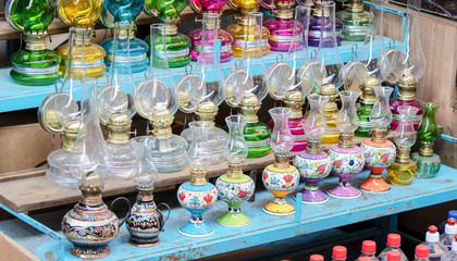 Close-up of a counter selling gas lamps. Painted with patterns of Eastern culture.