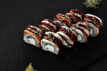 Sushi, rolls, fish dishes. Seafood delicacies