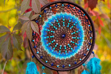 Handmade dream catcher with feathers threads and beads rope hanging