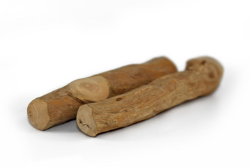 Long lasting chewable coffee wood stick for dog to chew on as occupation or dental care on white background