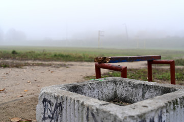 Photo of autumnal nature in the fog. Cloudy weather, boring mood.