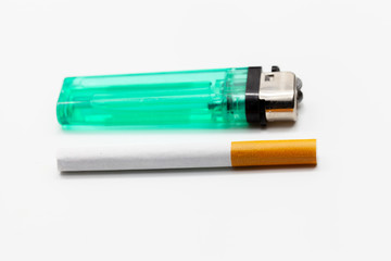cigarette and lighter isolated on white background