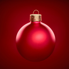 Red christmas ball close-up against dark red background