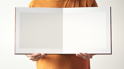 Mock up design templates. photo album in hand