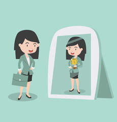 Obraz premium businesswoman looking standing in front of the mirror