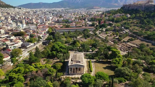 Aerial drone video of iconic Temple of Hephaestus in Ancient Forum of Athens historic centre, Attica, Greece