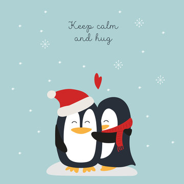 Christmas card with penguins hugs