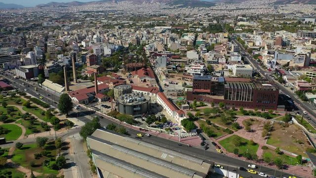 Aerial drone video of famous urban public area of Gazi and Kerameikos in the heart of Athens, Attica, Greece