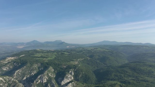 Foggy morning scenery with Deli Jovan Stol and Veliki Krs mountains 4K drone video