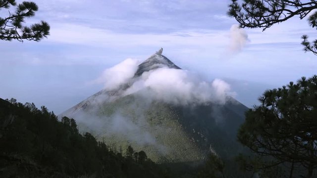 Static shot of Volcano Fuego erupting, daytime 4k