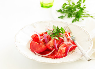 Tomato and onion salad. Selective focus
