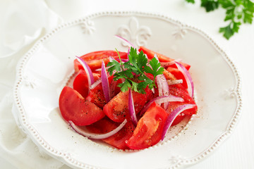 Tomato and onion salad. Selective focus