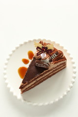 Christmas chocolate cake on dish with copy space