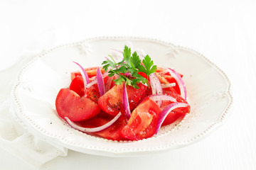 Tomato and onion salad. Selective focus