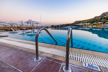 Obraz na płótnie Canvas Entrance to Swiming Pool at Hotel Resort, Sunrise Blue Hour, Rhode, Greece
