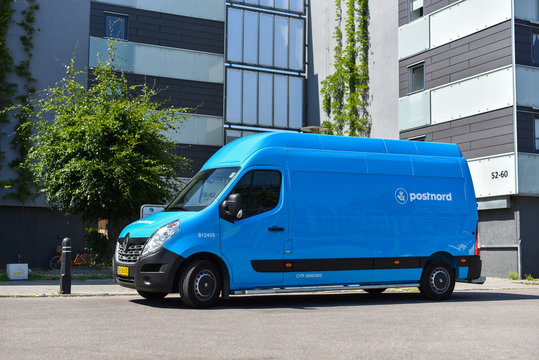 Copenhagen / Denmark - 07.24.19: PostNord van delivers correspondence to offices