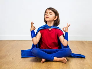 Foto op Canvas proud superhero child practicing yoga and meditation for zen humour © STUDIO GRAND WEB