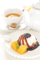 Chinese dessert, almond tofu and mango with chocolate sauce