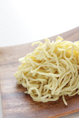 Chinese food ingredient, ramen noodles on wooden plate
