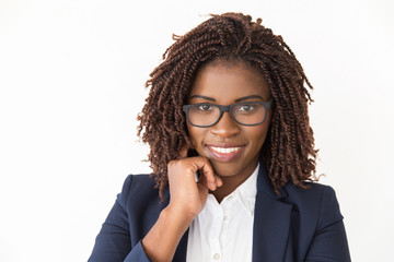 Happy young expert wearing glasses, smiling at camera. Young African American business woman...