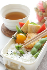 Japanese food, edamame soy bean and cutlet with tomato lunch box