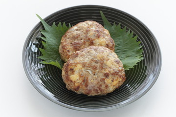 Homemade Tofu patty on dish with copy space