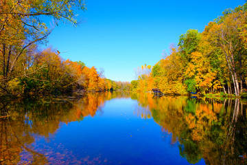 Golden autumn park,Autumn forest lake water landscape, Forest lake in fall, USA 