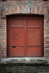 Old vintage window in a brick building