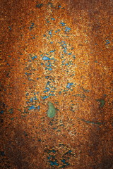 Fragment of an old rusty metal sheet