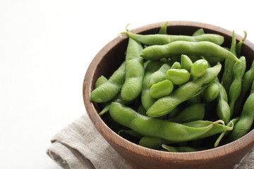 Japanese edamame soy bean in wooden bowl for healthy food image