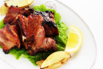 Korean food, pork spareribs  barbecue  served with lemon for gourmet food image