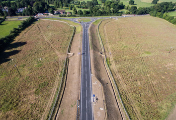 Fototapeta na wymiar Aerial View of a road through fields