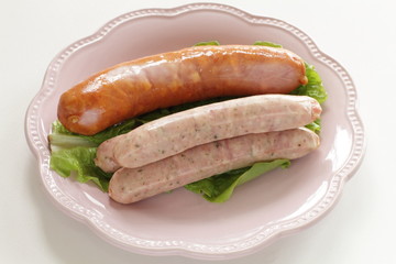 Prepared Germen sausage on dish with copy space